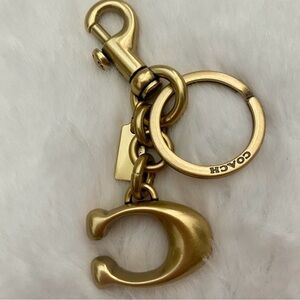 Coach Signature Gold  charm